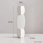 vases decoratifs modernes minimalistes geometriques blanc noir sculpturauxbranches feuillageintérieur decoration