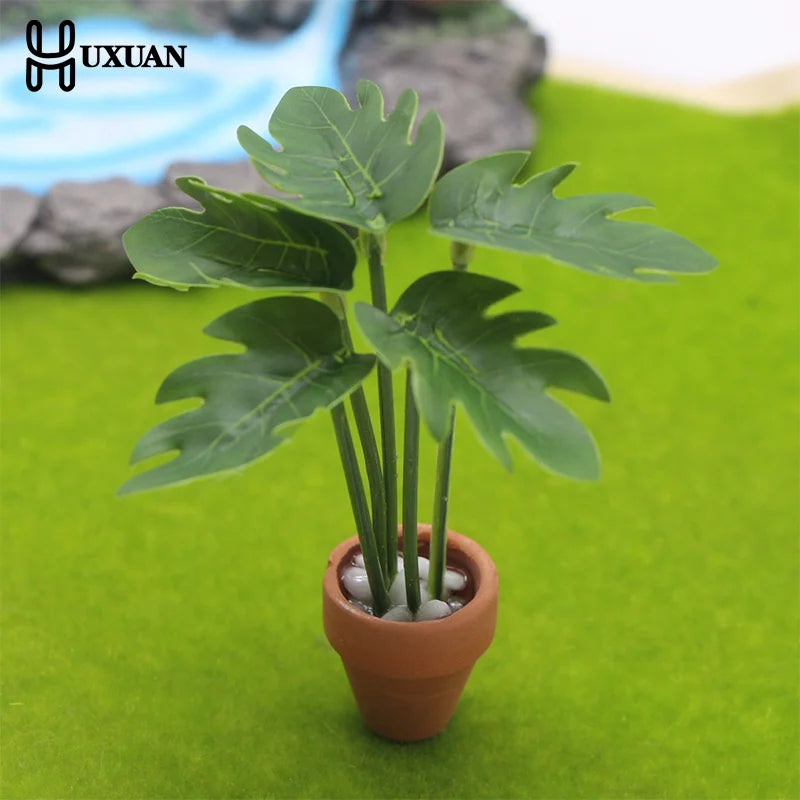 décoration intérieure plante artificielle fleurs feuilles pot terre cuite galets blancs moderne minimaliste