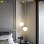 suspension lumineuse moderne minimaliste noir deux globes blancs métal chambre salon