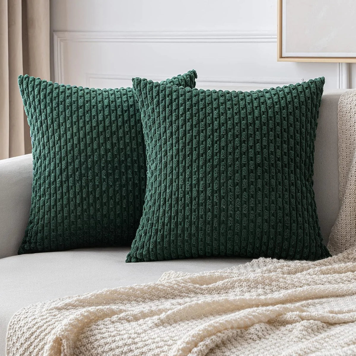 coussins carrés vert clair beige rose pâle texture tissée pompons moderne fermeture glissière