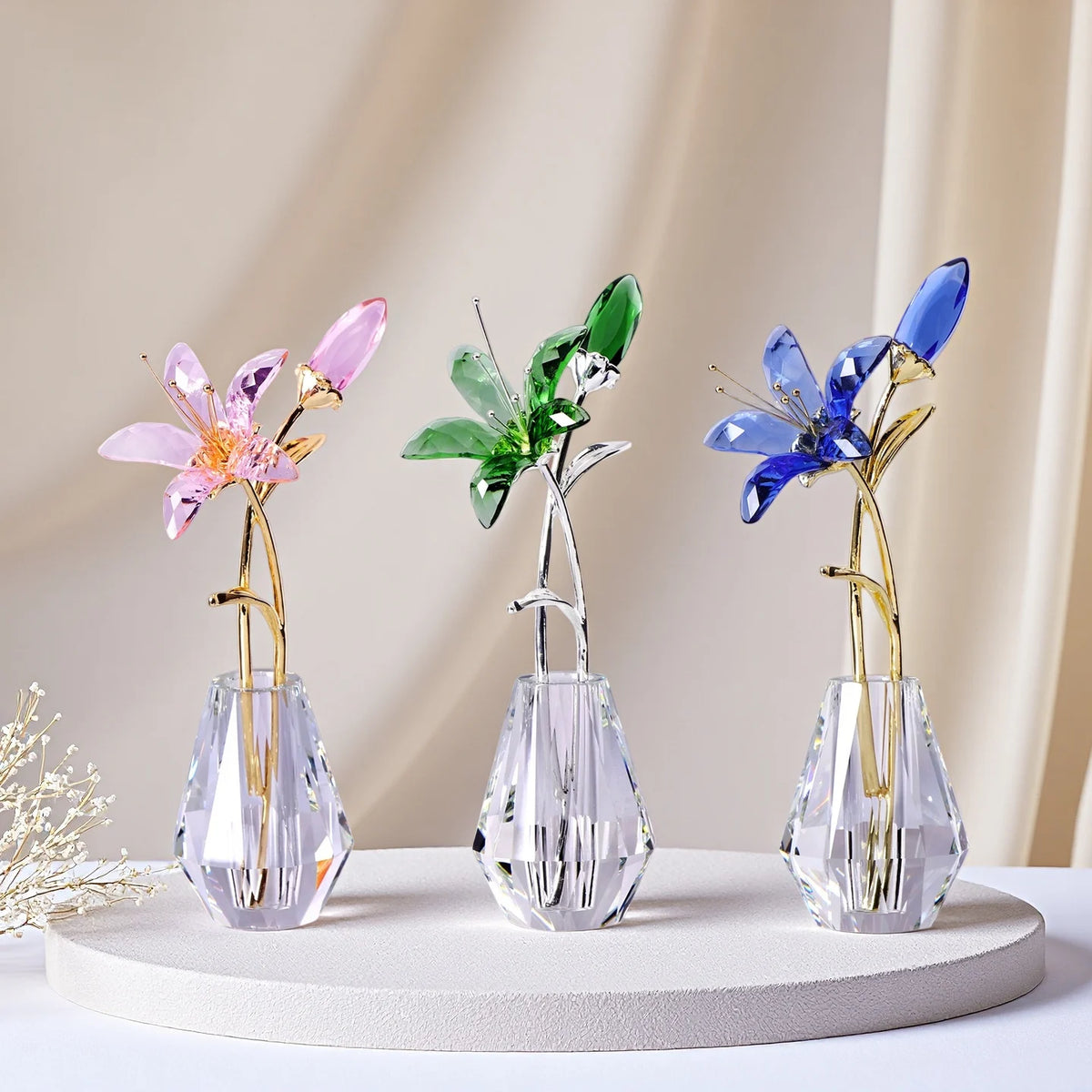 décoration contemporaine sculpture fleur artificielle cristal transparent feuilles dorées violet vert bleu rouge élégante
