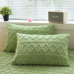 coussins décoratifs rectangulaires velours polyester géométrique losanges entrelacés bleu clair jaune gris rose vert