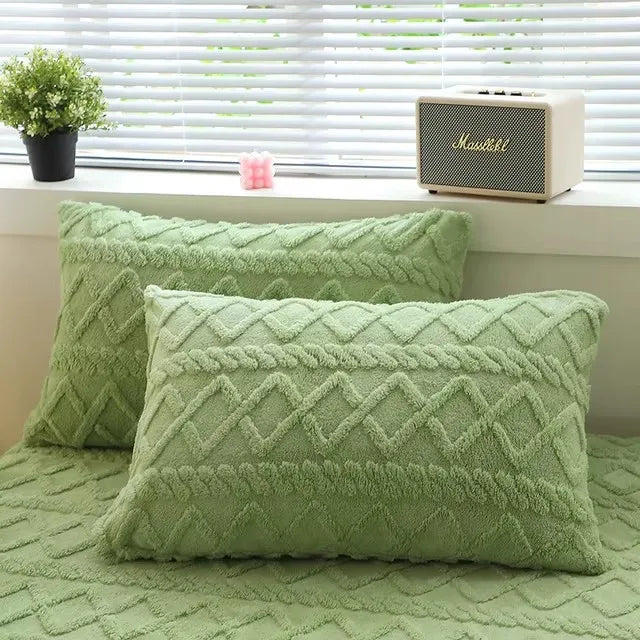 coussins décoratifs rectangulaires velours polyester géométrique losanges entrelacés bleu clair jaune gris rose vert