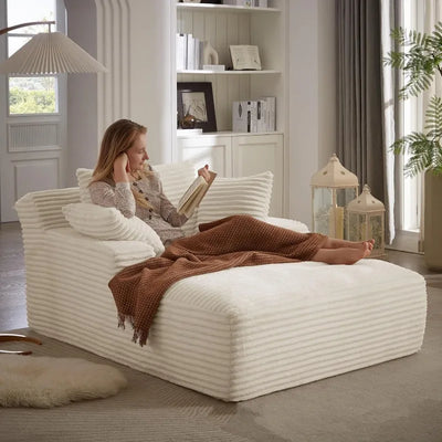 Canapé modulaire compressé ivoire dans chambre adulte moderne
