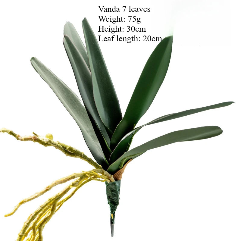 plantes artificielles vertes feuilles larges nervures dorées décoration intérieure moderne minimaliste pot verre support