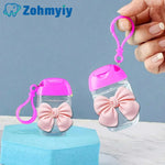 flacon gel hydroalcoolique transparent rose ruban noeud clip moderne rechargeableextérieur