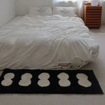 tapis imperméable anti dérapant moderne blanc noir cercles superposés chambre couloir entrée