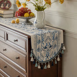 tableau decoratif lin motifs floraux pompons multicolores table buffet ethnique rustique