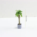 décoration intérieure plante artificielle fleurs feuilles pot terre cuite galets blancs moderne minimaliste