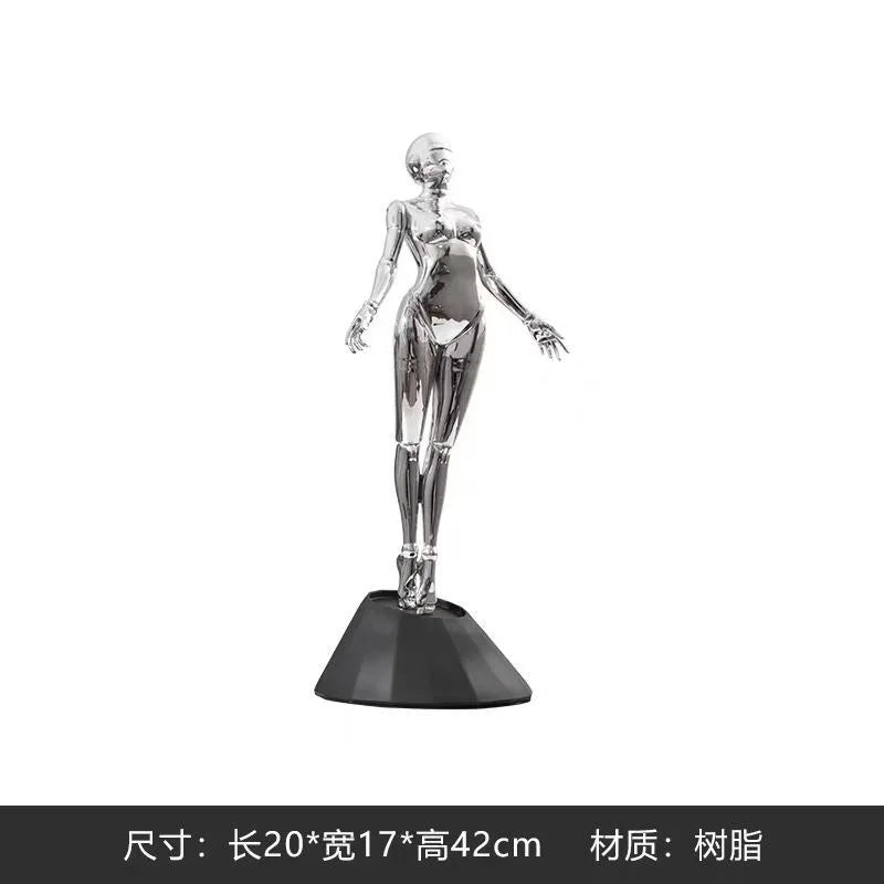 figurine humaine moderne argentée table chaises vases livres decoration intérieure robotique