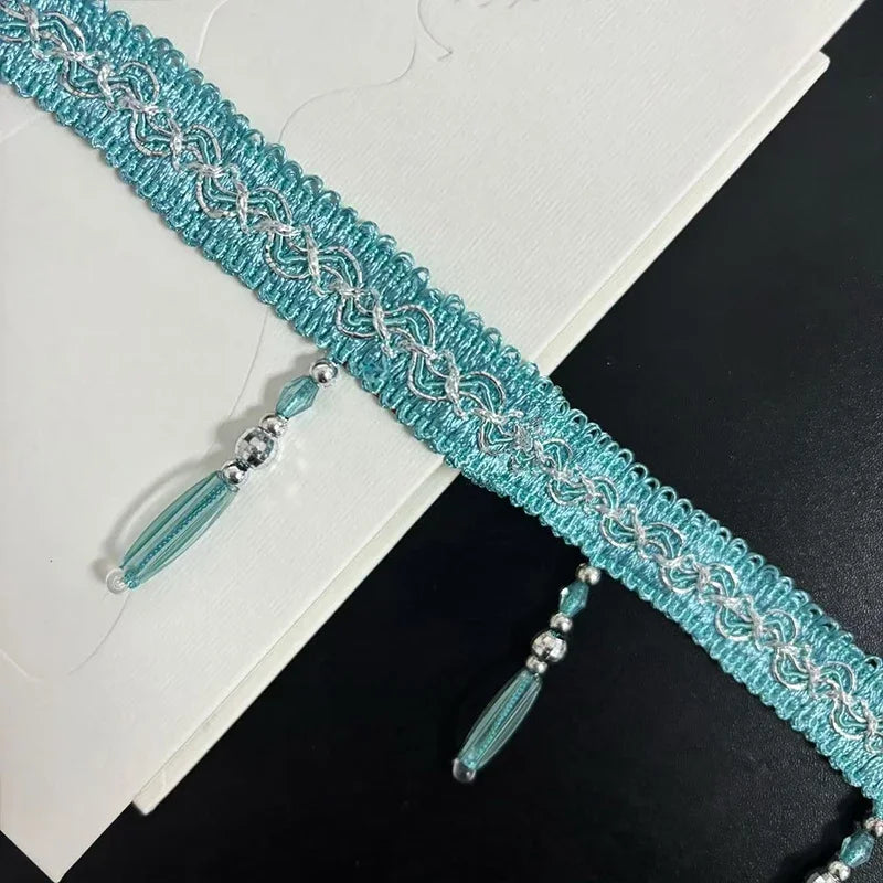 ruban décoratif pompons motif géométrique classique bleu clair bleu foncé noir vert clair