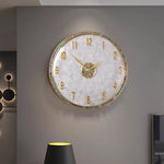 horloge murale moderne or blanc cadran marbré aiguille salon étude