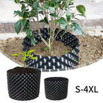 grille drainage plante noir moderne perforations circulaires différentes tailles incluses