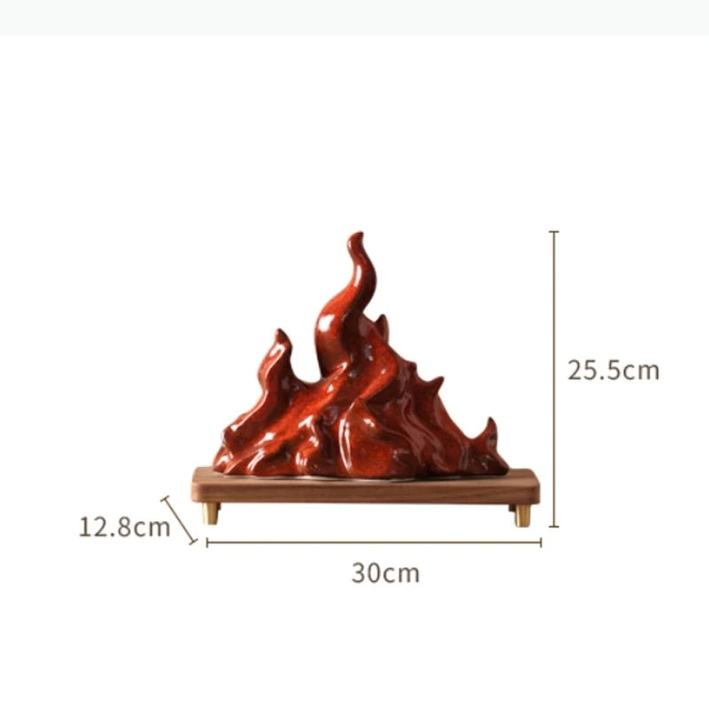 sculpture moderne flamme rouge brillante effet métallique pied bois doré