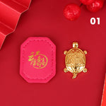 pendentif tortue dorée motif cuir rouge orné feng shui chance richesse décoration intérieure souvenir