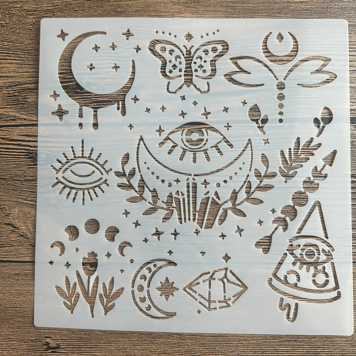 Stencil blanc motifs floraux géométriques papillon lune artisanal laser cut 20cm 20cm