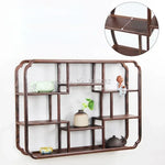 étagère murale bois sculpté classique marron statuettes théières vases tasses rangement cuisine déco