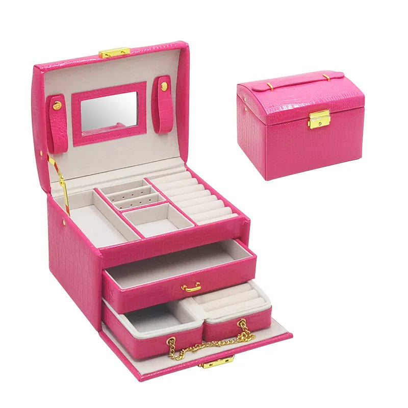boîte bijoux rouge croco miroir compartiments poignée boutons dorés classique porte bijoux sécurité