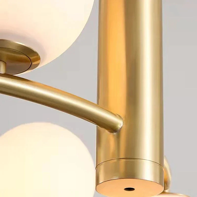 suspension luminaire moderne sphères verre translucides anneau métal doré salon chambre scandinave