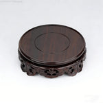 support bois ornements sculptés complexe artisanal marron foncé traditionnel décoration maison objet décoratif stand