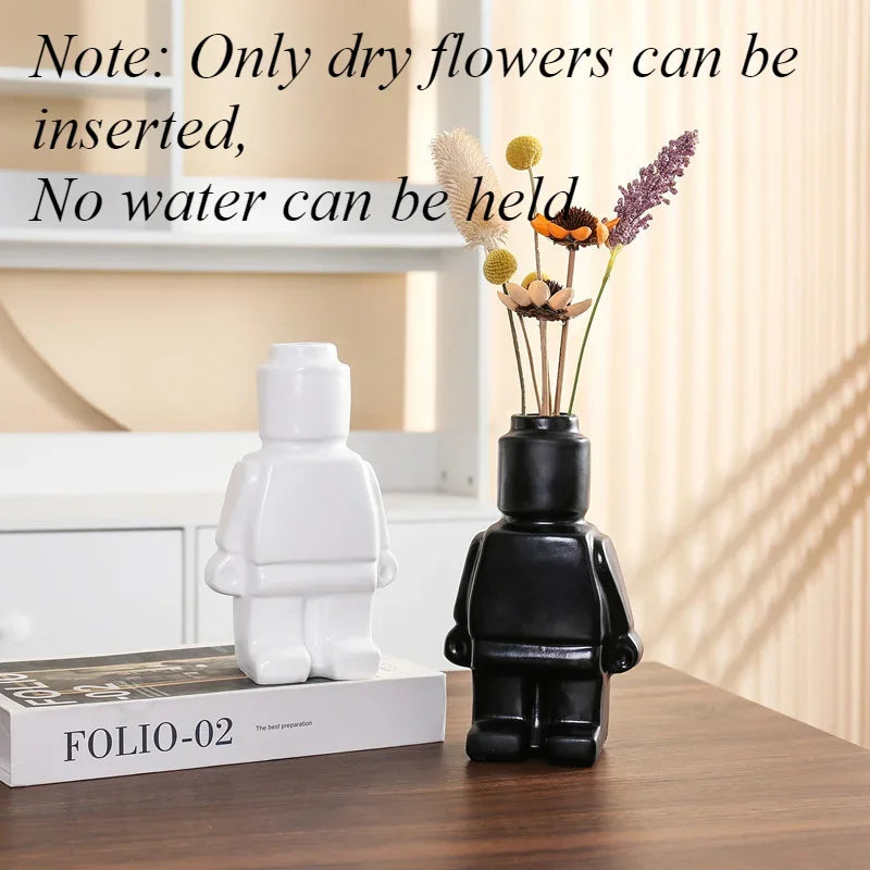vases figurines lego blanc noir vert texture granuleuse deco ludique fleurs seches variées maison