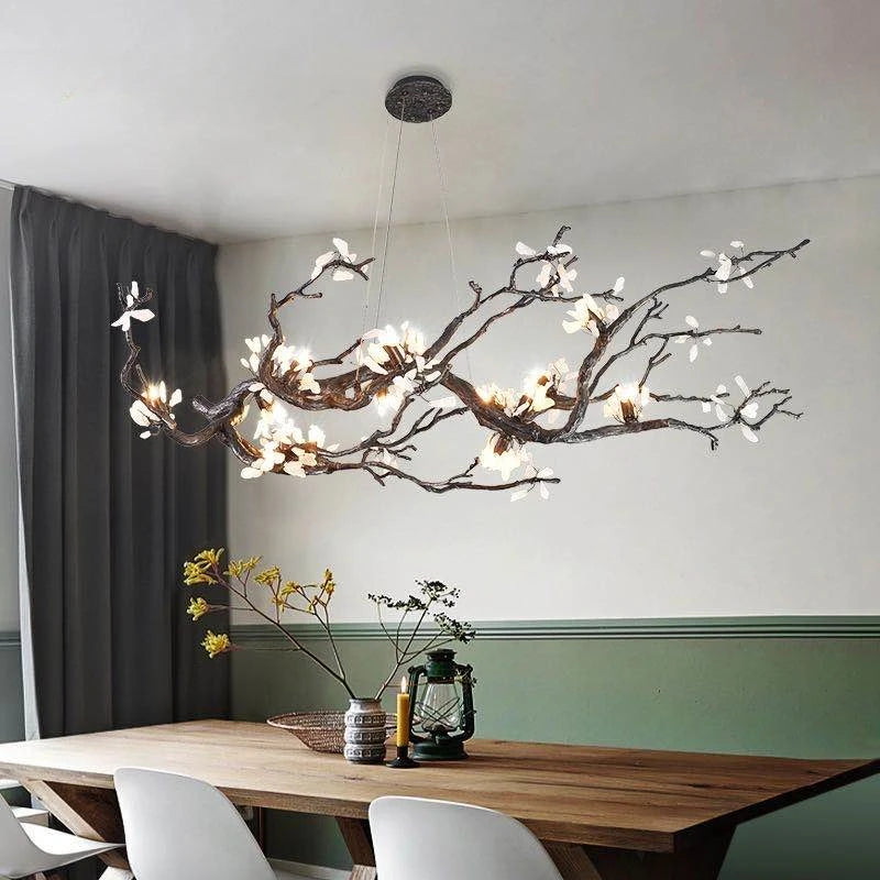 suspension luminaire branches cuivre fleurs artificielles moderne noir blanc salon salle manger intérieur