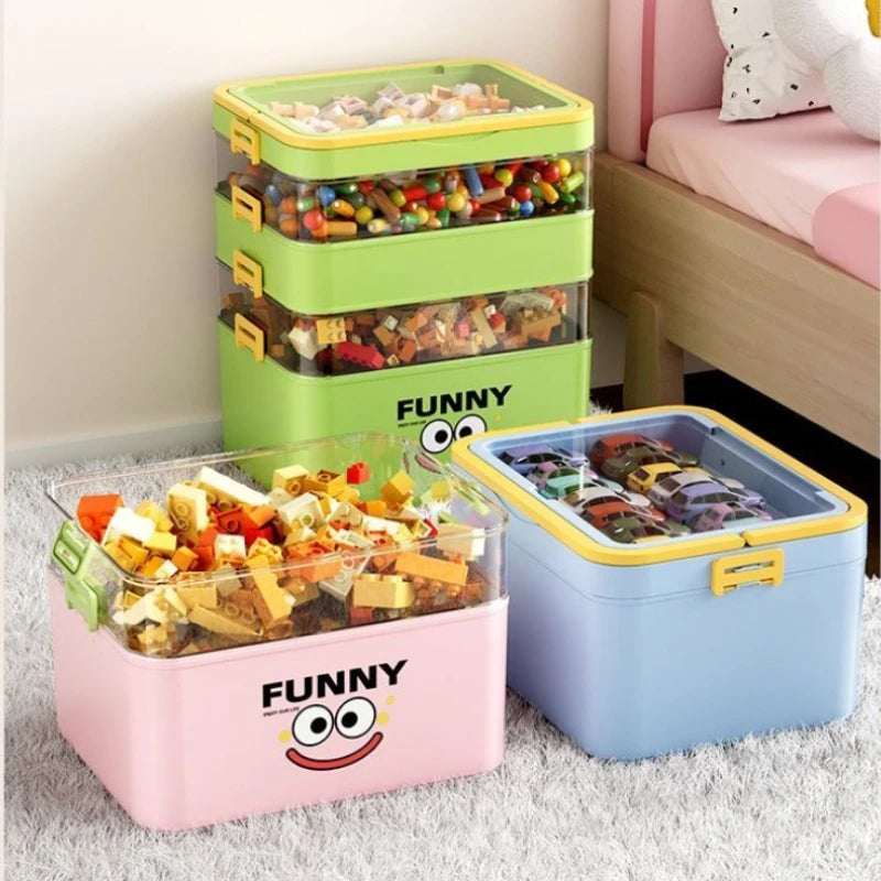 boîtes rangement jouets vert rose bleu motif funny souriant contemporain pratique triangles carrés