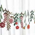 guirlande festive fleurs multicolores anniversaire mariage décoration papier texturé moderne