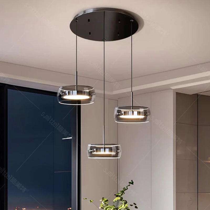 suspension lumineuse moderne trois abat jours argentés abat jours transparents éclairage led salon chambre