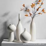 vases céramique blancs rayures horizontales modernes fleurs artificielles