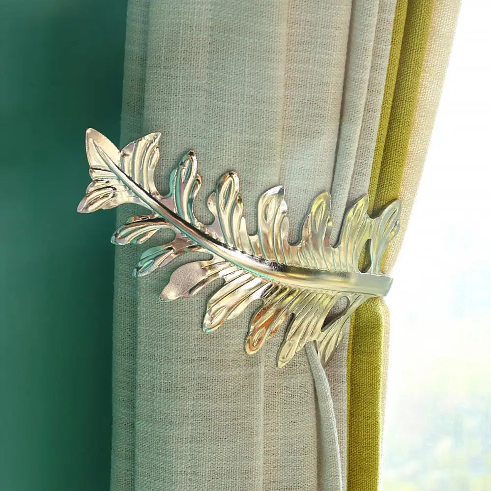 pince rideau métal moderne feuille stylisée argent doré cuivre opaque
