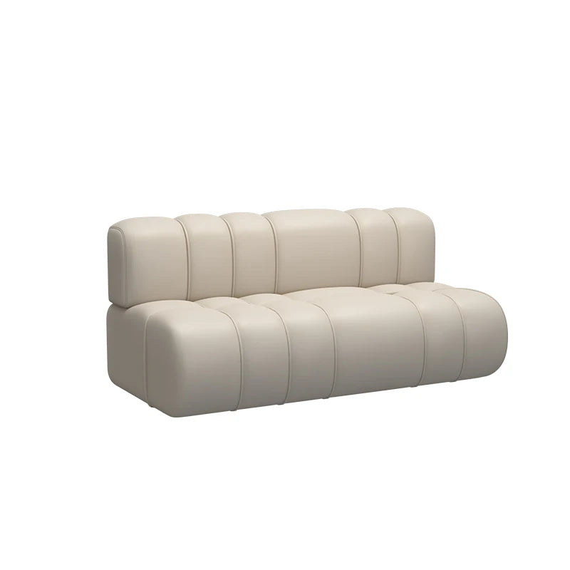 canapé modulable marron clair cuir moderne table noire tabourets noirs meuble salon minimaliste