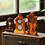 horloges décoratives vintage ornées motifs floraux couleur orange noir marron doré