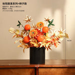 décoration intérieure moderne fleurs artificielles vase noir roses arrondies éléments dorés asiatique