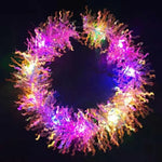 couronne lumineuse festive tissus brillants couleurs vives bleu rose violet lumineux tinsel opaque festive