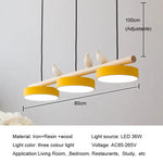 lampe suspendue moderne minimaliste led gris blanc rose jaune bleu oiseaux résine bois