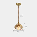 suspension lumineuse verre teinté art deco or marron bleu clair motifs géométriques opacité chaînes