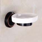 accessoires salle bain noir classiques rondelles dorées porte serviettes savon papier toilette brosse wc
