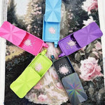 boîte violet vert bleu moderne motifs géométriques opaques roses