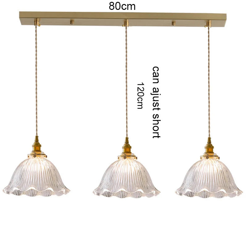 suspension lumineuse vintage vert doré motifs géométriques ampoules câbles chaînes métal