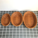 paniers rangement rotin tressé marron clair traditionnels réutilisables fourchettes bois décoration maison multifonctionnels