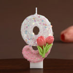 bougies forme chiffres blanc rose vert paillettes fleurs roses feuilles vertes festive tringle boîte