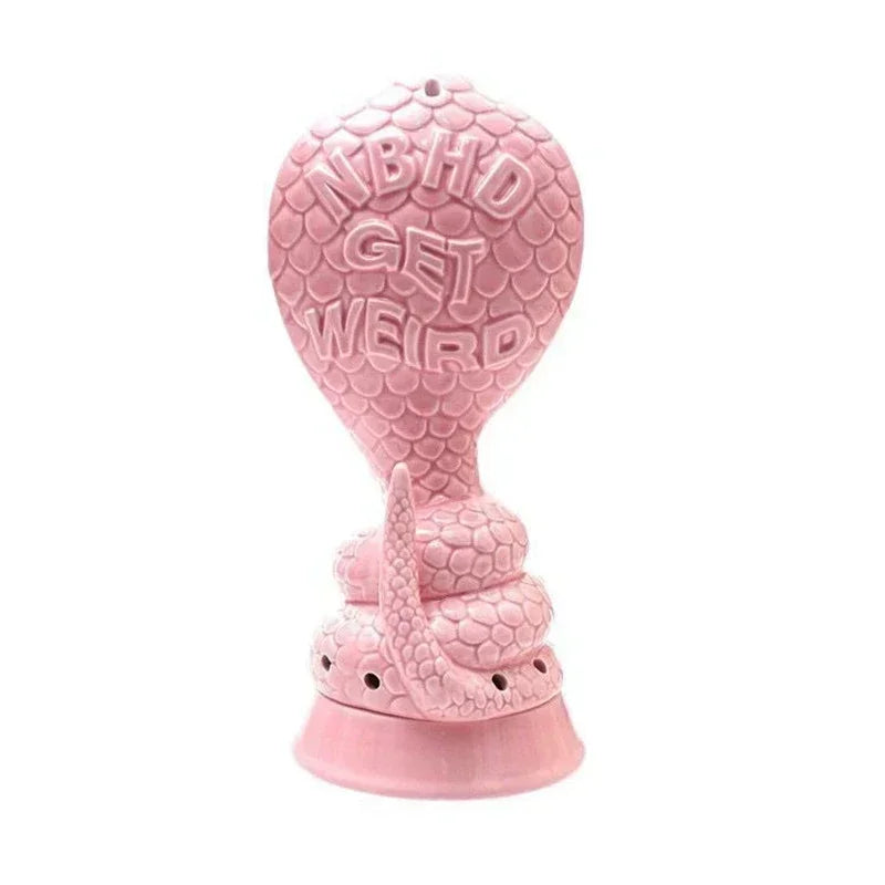 brûleur d'encens moderne cobra rose blanche texturé serpentins décoration intérieure contemporaine