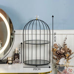 cage bijoux moderne or noir marbre élégante pinceau maquillage flacons cosmétiques diverse ornementalité respectueux