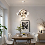 Suspension lumineuse moderne verre noir blanc gris billes translucides chaîne métallique
