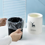 petite poubelle cuisine ronde plastique blanc noir motif cerf lettre minimaliste