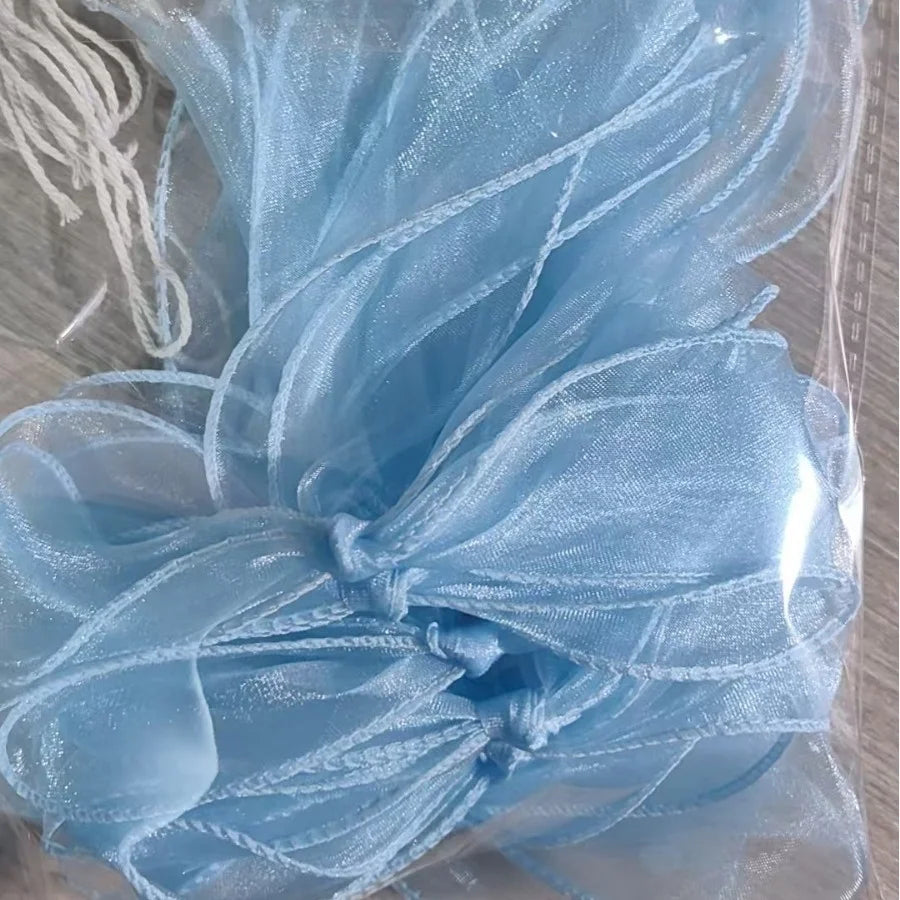 guirlande décorative festives rose noeuds tissu texturé semi transparent mariage anniversaire fille préparation naissance