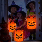 sac lumineux citrouille halloween orange noir motif yeux triangles LED enfants festif