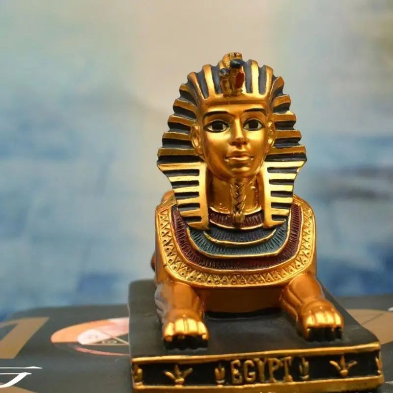 figurine sphinx égyptien or bleu noir réplique antique ornements dorés base egyptienne decoration maison