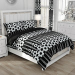 Parure de lit housse de couette 220x240 fleurs noires en microfibre sur un lit